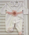 Tutina bianca con fiore rosa