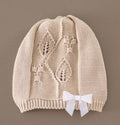 Cappellino cipria fiocco bianco