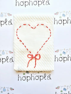 Copertina con ricamo cuore