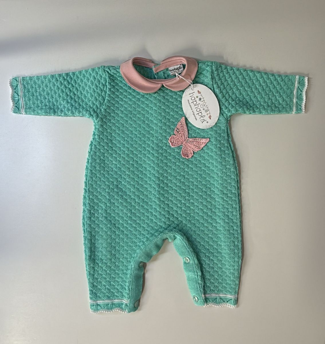 Tutina verde con farfalla rosa