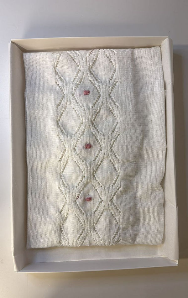 Copertina con rombi in maglia bianca