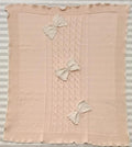 Copertina rosa con fiocchetti piccoli