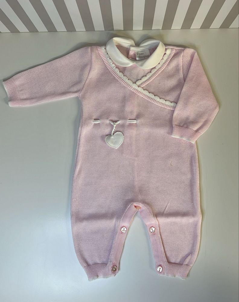Tutina rosa incrociata con cuore pendente bianco