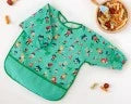 Bavaglino impermeabile con maniche verde Kiokids