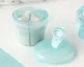 Dosatore girevole per latte in polvere azzurro Kiokids