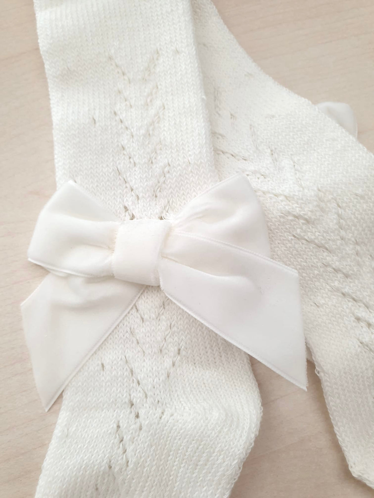 Collant da neonata con fiocchetto – confezione da 6 paia color latte