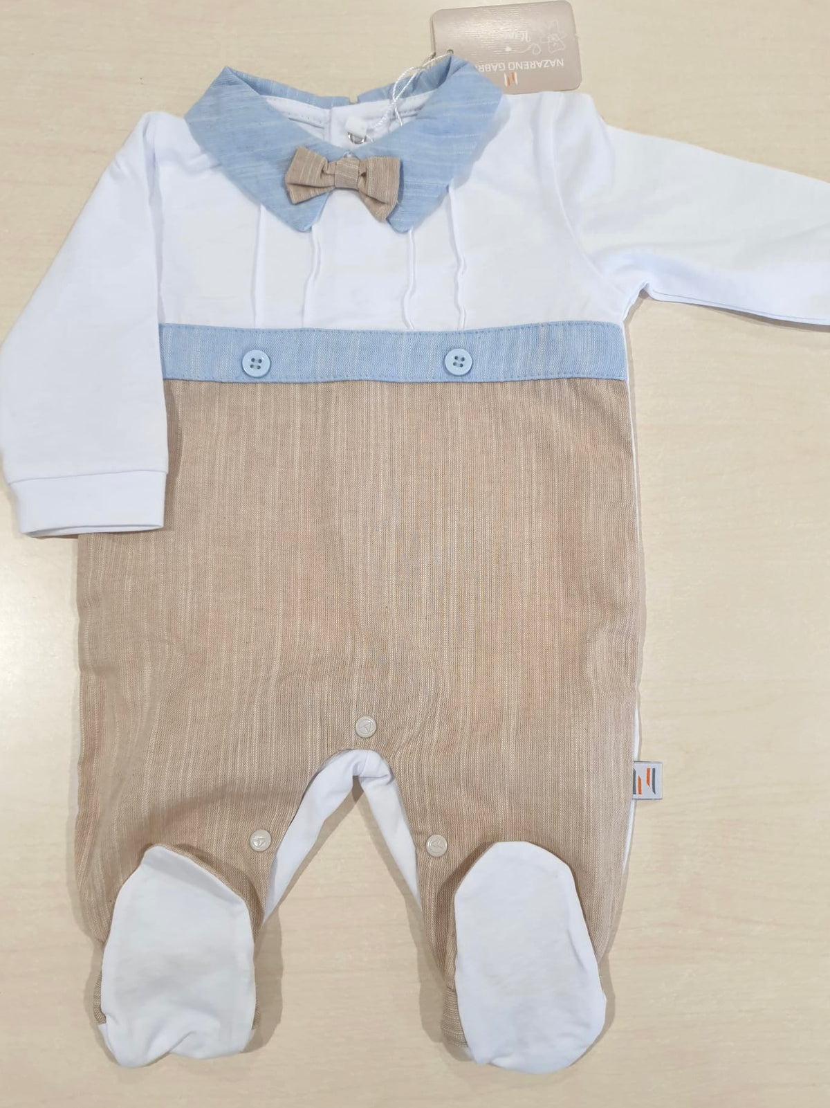 Tutina con fiocchetto a papillon
