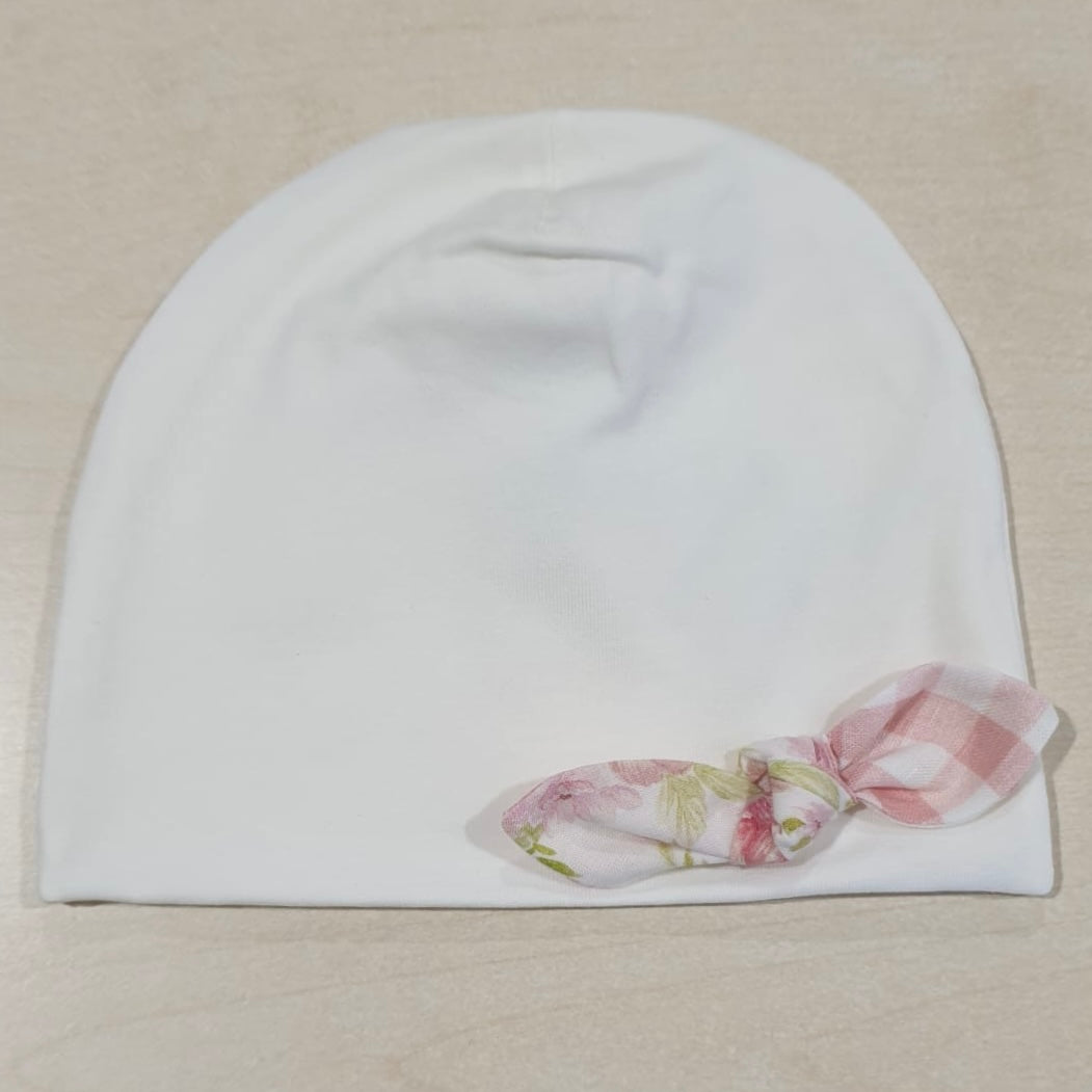 Cappellino in cotone fiocchetto