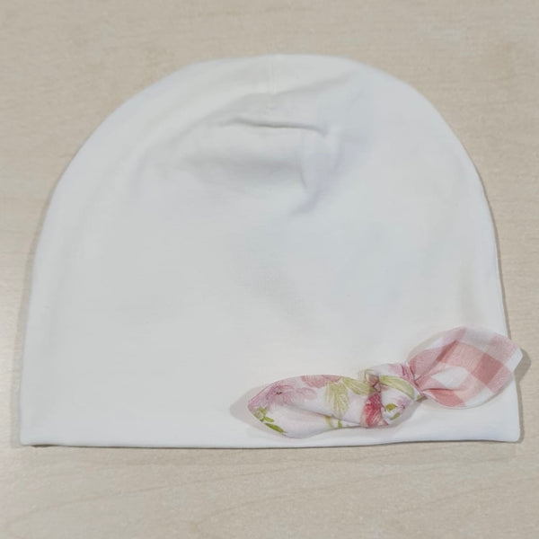 Cappellino in cotone fiocchetto