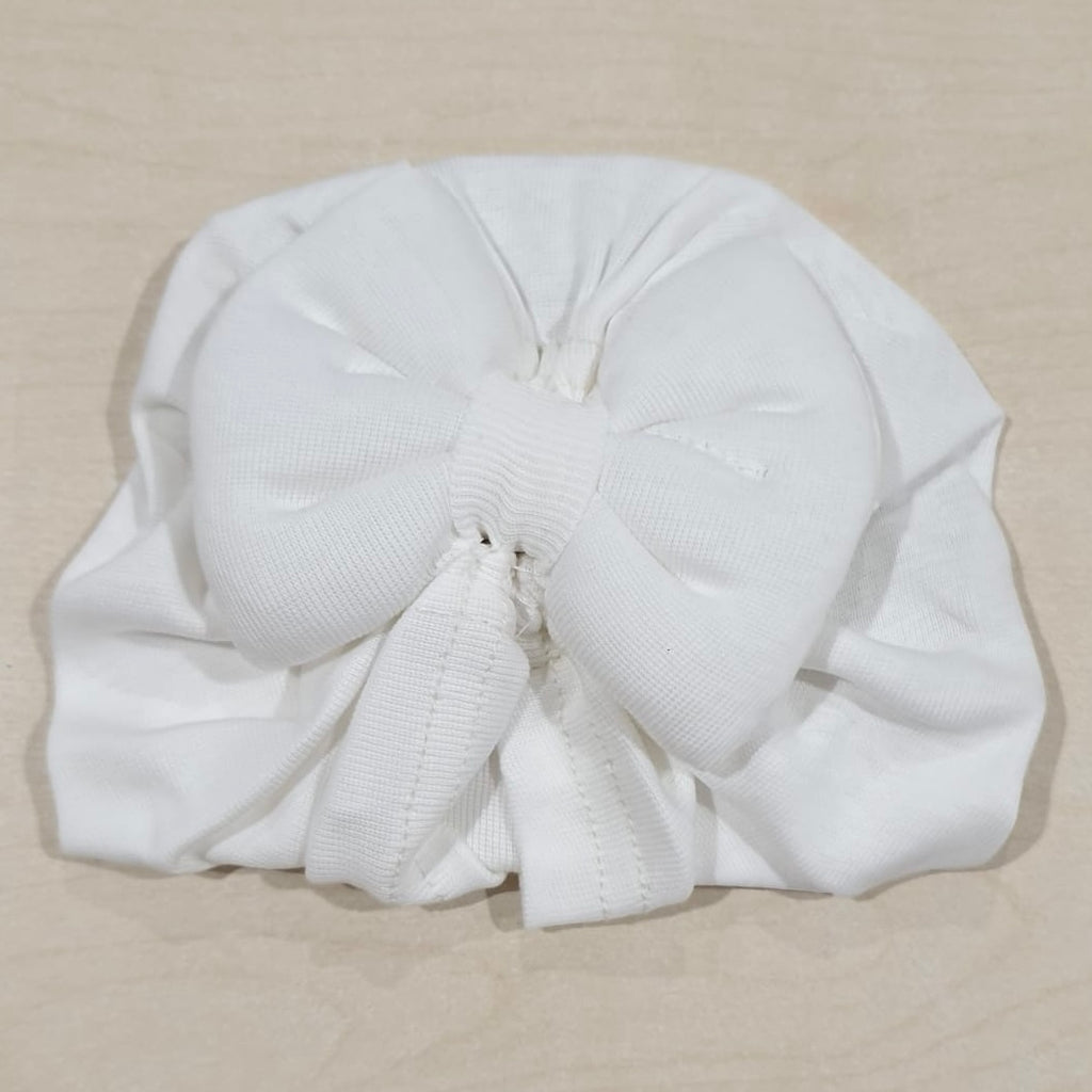 Cappellino a turbante in maglia neonata
