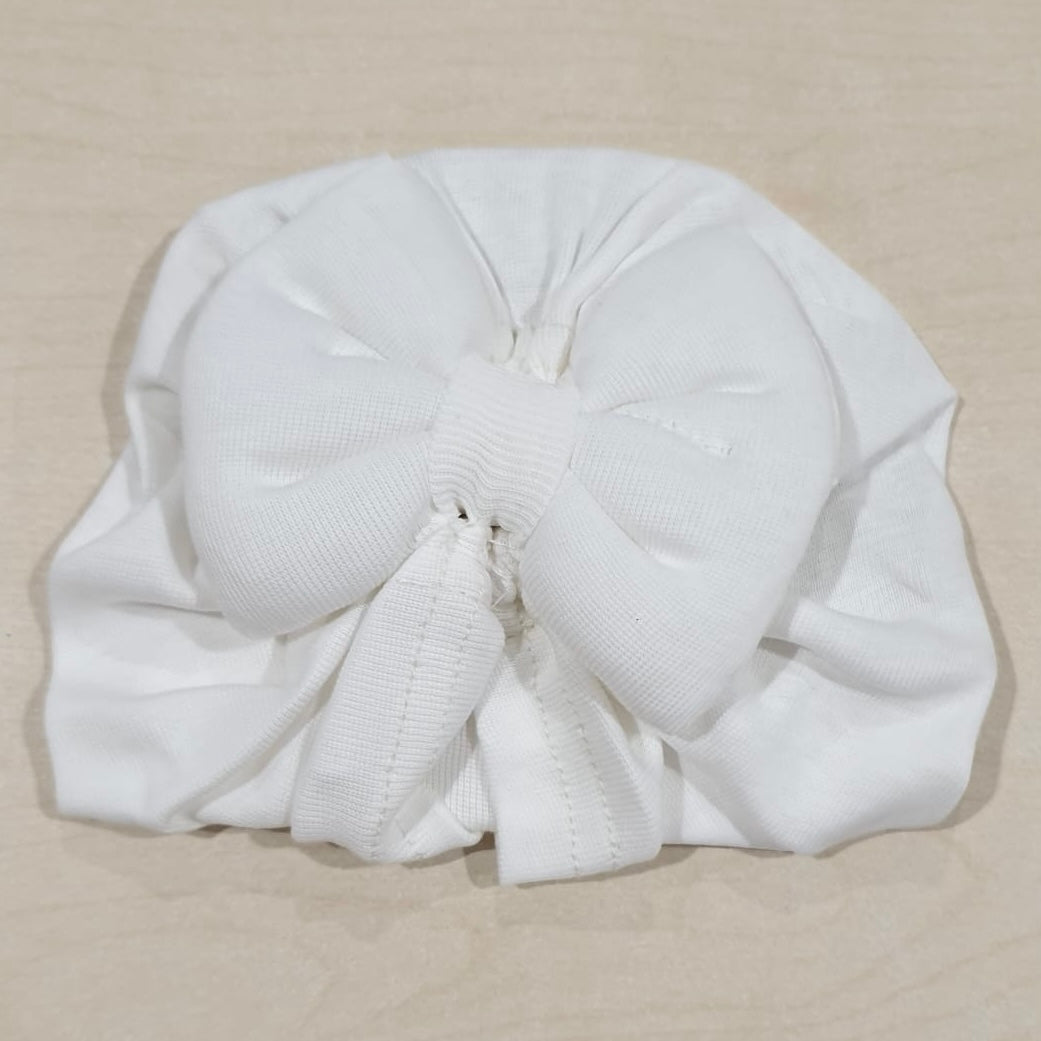 Cappellino a turbante in maglia neonata