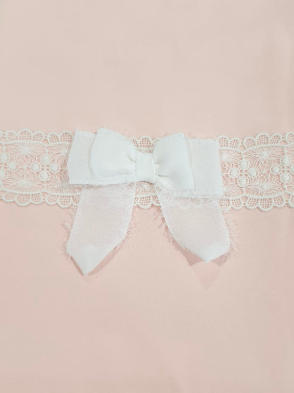 Copertina rosa in cotone fiocco bianco ricamato