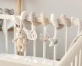 Peluche spirale orsetto beige Kiokids