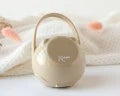 Porta succhietto con gancio beige Kiokids
