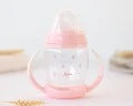 Tazza apprendimento con manico rosa Kiokids